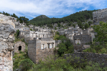 Fototapeta na wymiar Kayakoy ghost village. Turkey's abandoned houses. The Ghost Town of Kayakoy. Abandoned religious ghost city