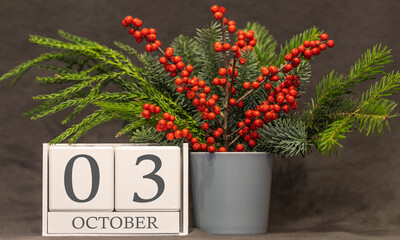 Memory and important date October 3, desk calendar - autumn season.