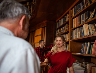 Beautiful female student looking at the professor