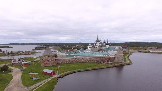 Solovki Russia kremlin aerial drone footage, tourism of north White Sea, liftup and close 4K
