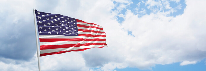 united states flag waving on a beautiful day