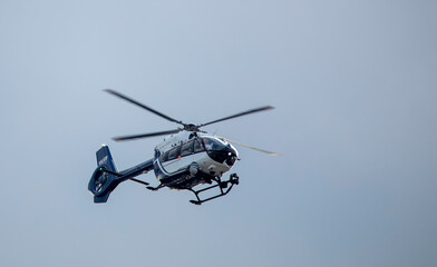Fototapeta premium Police helicopter black and white. Modern, equipped with the latest equipment.