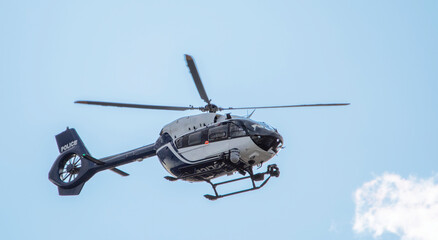 Police helicopter black and white. Modern, equipped with the latest equipment. - obrazy, fototapety, plakaty