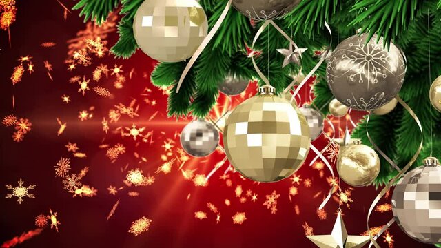 Animation of christmas boubles and snow falling over red background with glowing light