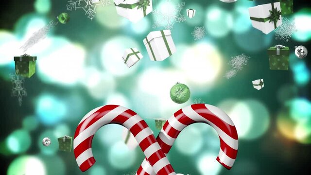 Animation of candy canes, christmas boubles and presents and snow falling over green background