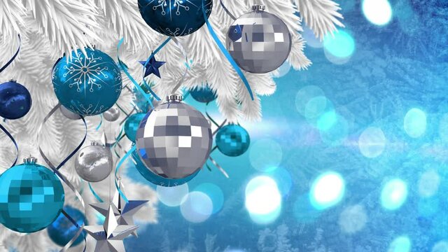 Animation of christmas boubles and snow falling over blue background with bokeh