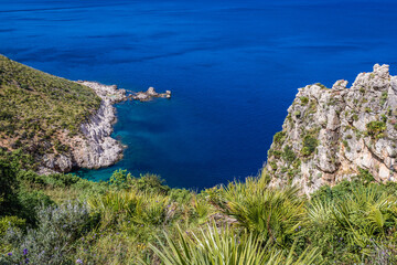 Punta Leone and Cala del Varo inlet in Zingaro natural reserve on the shore of Castellammare Gulf...