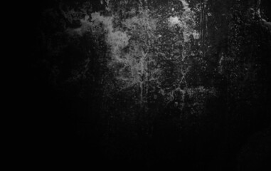Dark scary grunge background with scratches, slightly light black concrete cement texture for background
