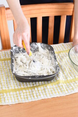 cooking some sardines flouring process