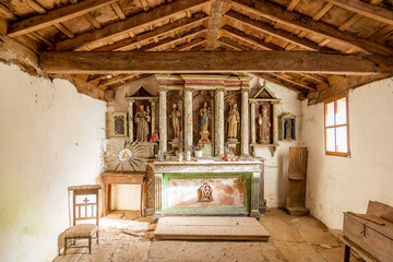 Sneak Peek into Abandoned Dusty Inside Interior of San Pedro Chapel on the Way of St James Pilgrimage Trail Camino de Santiago