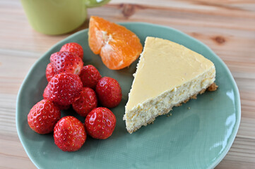 A not-so-good homemade baked cheesecake. With strawberries on the side.