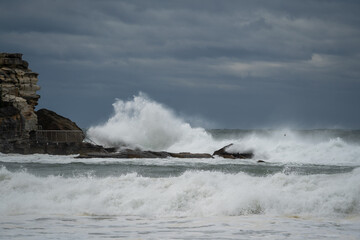 waves crashing on rocks