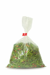 Guinea pepper in plastic bag packaging isolated on white background.