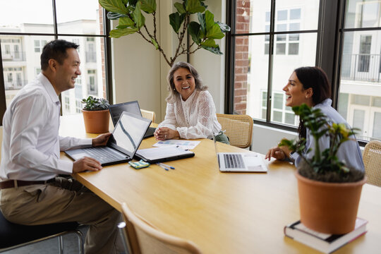 Multiethnic Small Business Team Gathered For A Meeting