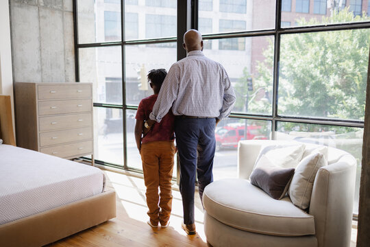 Black father guides son in positive direction