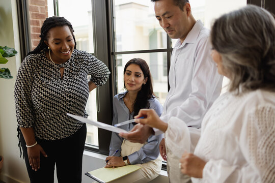 Diverse Group Having Informal Team Meeting