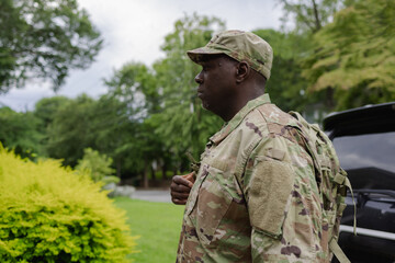 Black military man arrives home from service, active duty