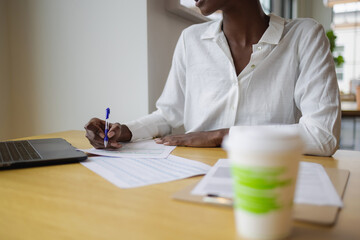 Business woman taking notes