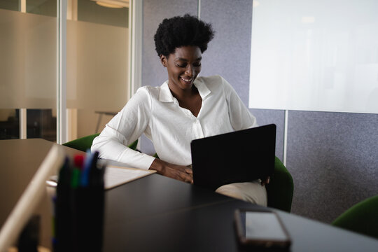 Business Woman Using Laptop In Office