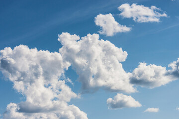 Clouds on a clear sunny summer day.