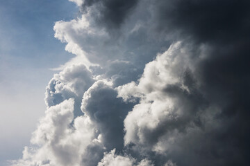 Cumulonimbus clouds on a clear sunny summer day.