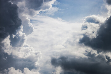 Cumulonimbus clouds on a clear sunny summer day.