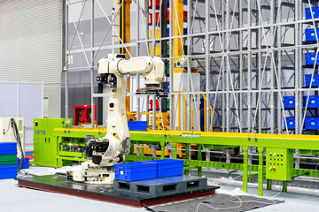 smart robot with automatic arm grip system for carry arrange product box to conveyor line and storage on shelf at warehouse