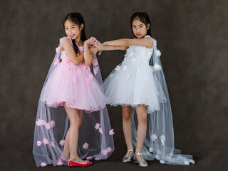 Portrait studio shot of little cute Asian kid