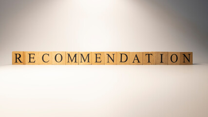 The word recommendation was created from wooden cubes. Consumption and shopping.