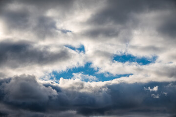 Dramatic cloudy sky background. Dark blue stormy cloudy sky. Natural photo background