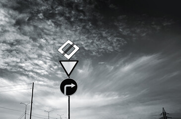 sign with clouds