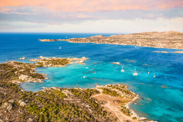 View from above, stunning aerial view of La Maddalena Archipelago with its turquoise, crystal clear bays of water. Caprera Island in the distance. Sardinia, Italy.