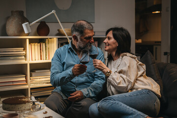 adult couple celebrating anniversary at home