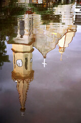 reflection of a church in the water