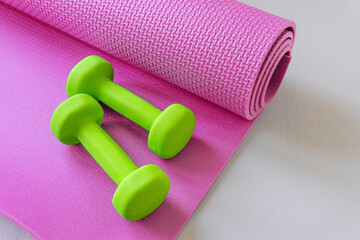 Dumbbells on background. The concept of a healthy lifestyle.