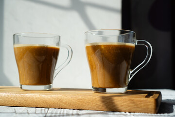 Cold or hot coffee with milk for two people
