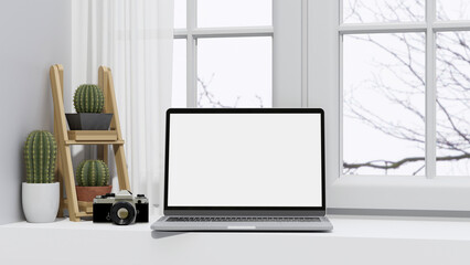 Laptop computer blank screen mockup in white minimal working space design