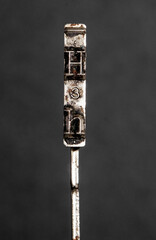 Naklejka premium retro typewriter macro letter H