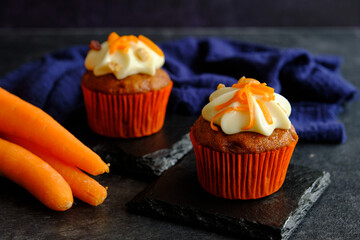 carrot cakes in close-up on a dark background