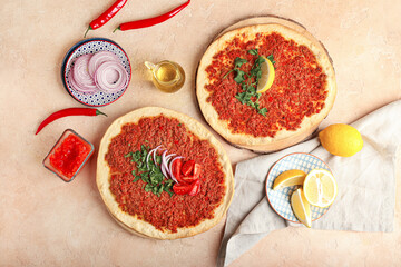 Boards with delicious Turkish pizza on color background