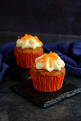 carrot cakes in close-up on a dark background