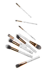 Set of cosmetic brushes on white background