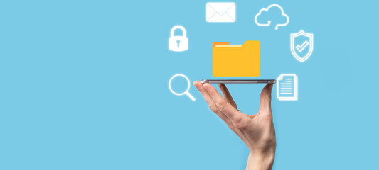 Document Management System DMS .Businessman hold folder and document icon.Software for archiving, searching and managing corporate files and information.Internet Technology Concept.Digital security
