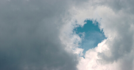 White clouds on a blue sky background