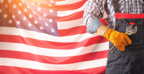 Worker on nation flag background. Labor day holiday concept. USA