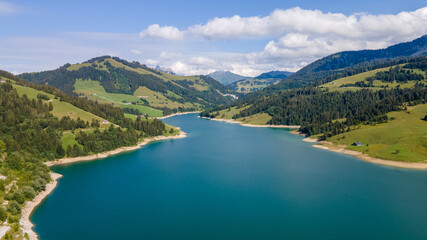 Fototapeta na wymiar The lake of l'Hongrin and its dam, Switzerland. 