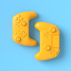 Set of lying gamer joysticks or gamepads on blue and yellow background © Vasyl Onyskiv