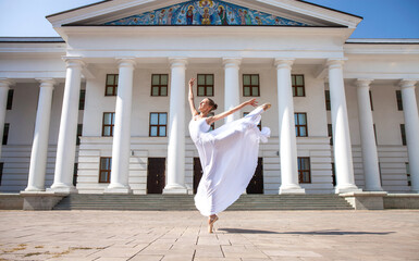 young ballerina dancing in the street © Andrey_Arkusha