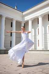 young ballerina dancing in the street © Andrey_Arkusha