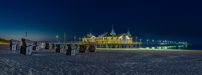 The Pier of Ahlbeck at the Baltic Coast (Island Usedom, Germany) in dusk light - panoramic view - obrazy, fototapety, plakaty